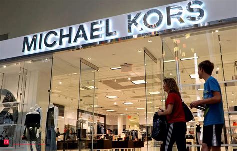 michael kors bought louis vuitton|Coach Owner to Buy Parent of Versace and Michael Kors in .